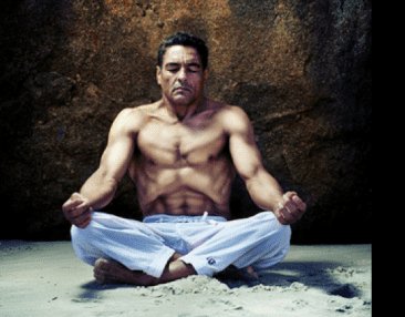 Rickson Gracie meditating on the beach